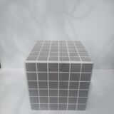Gray tiled cube