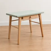 Small vintage children's desk attributed to Baumann – natural wood and lizard green top.