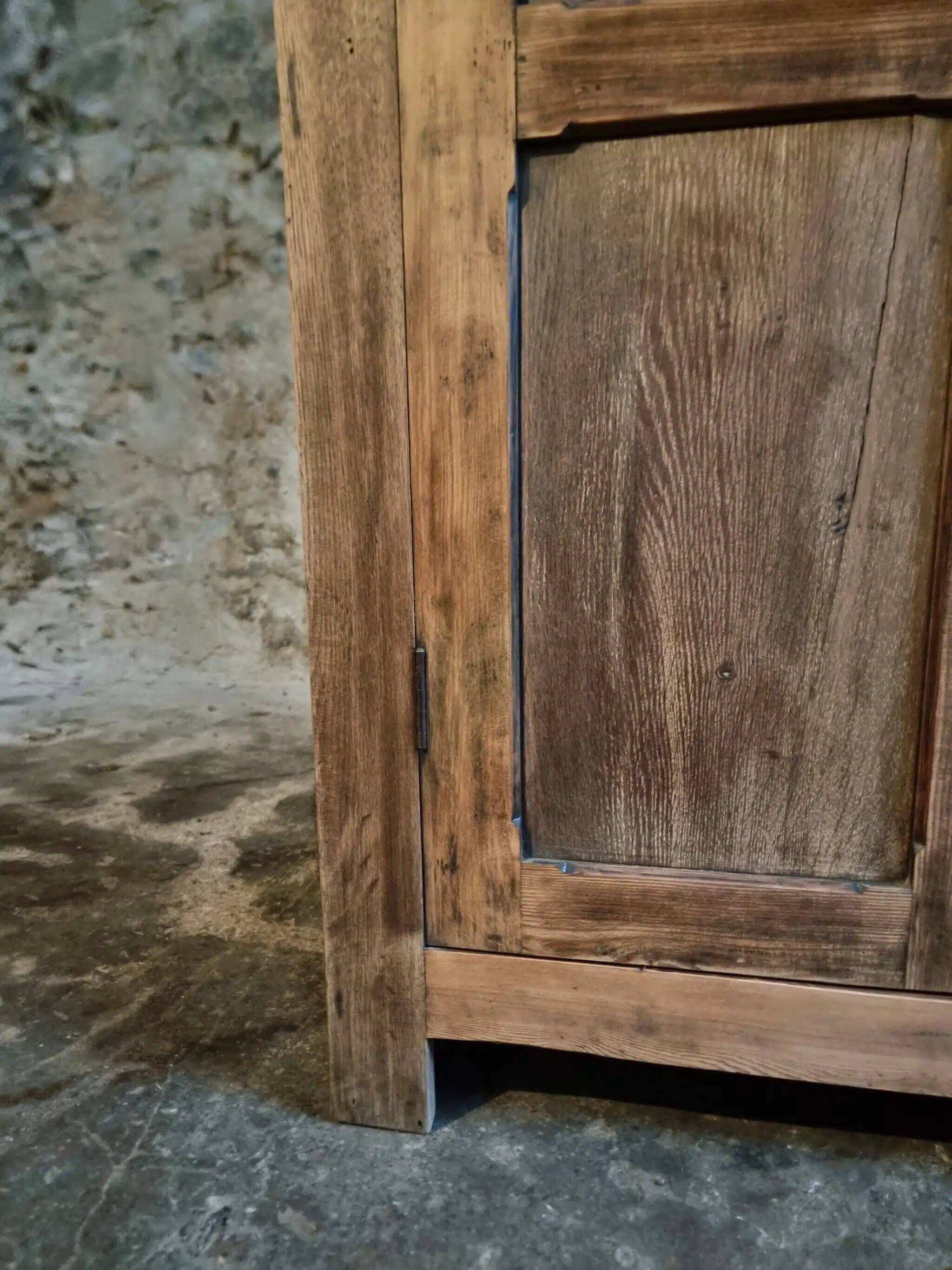 Antique French wardrobe in oak and pine, late 19th century.