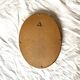 Small vintage wall mirror in gold resin