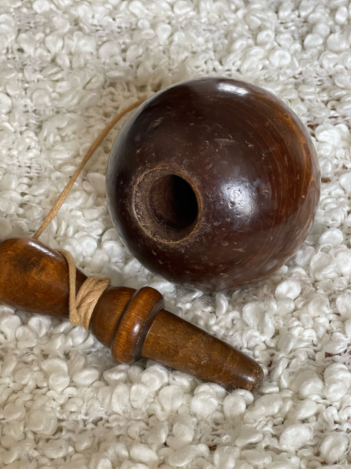 Old bilboquet in turned wood