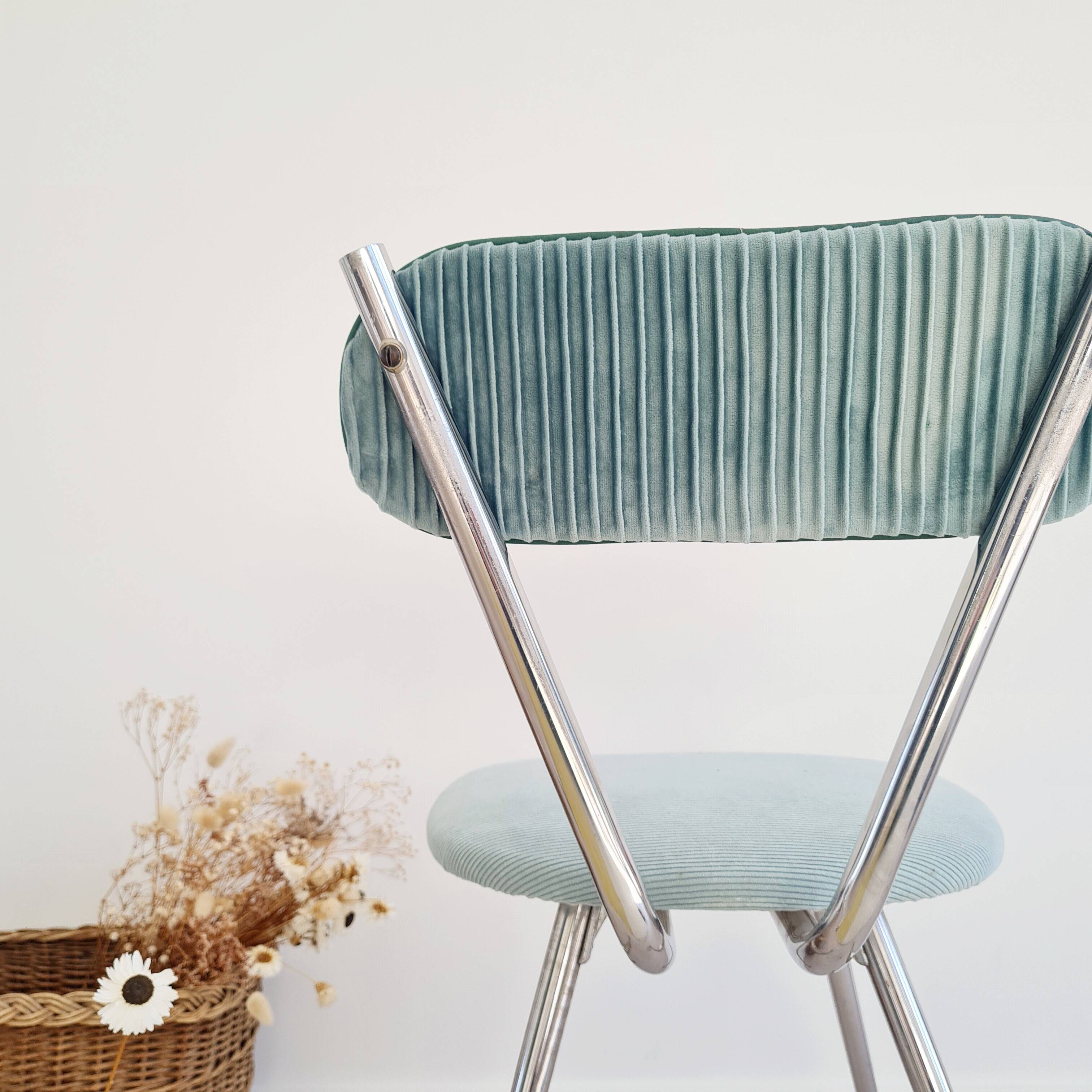 Old chrome metal and blue velvet chair