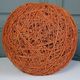 Orange lampshade in cord and rattan from the 1970s