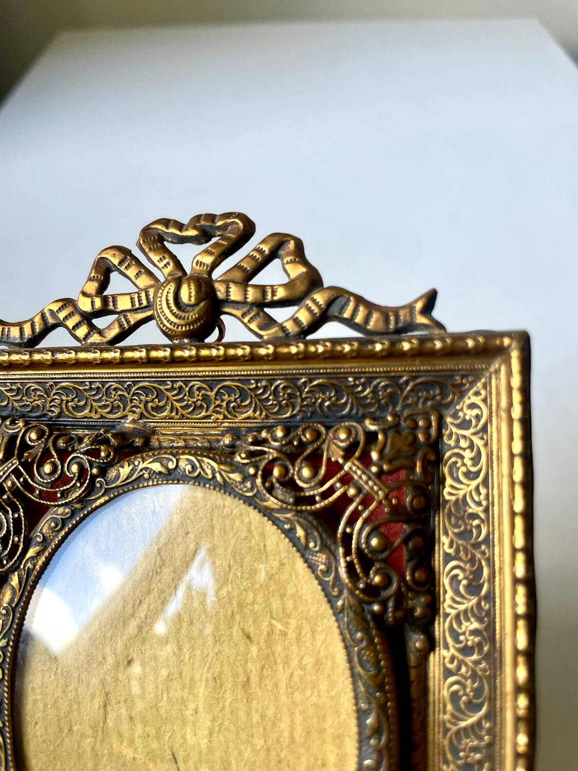 Antique metal frame gold coloured brass   frame 10.5 cm x 9 cm  convex glass