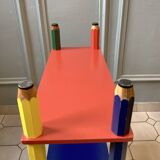 Postmodern round table, chair and bookcase by Pierre Sala 1980