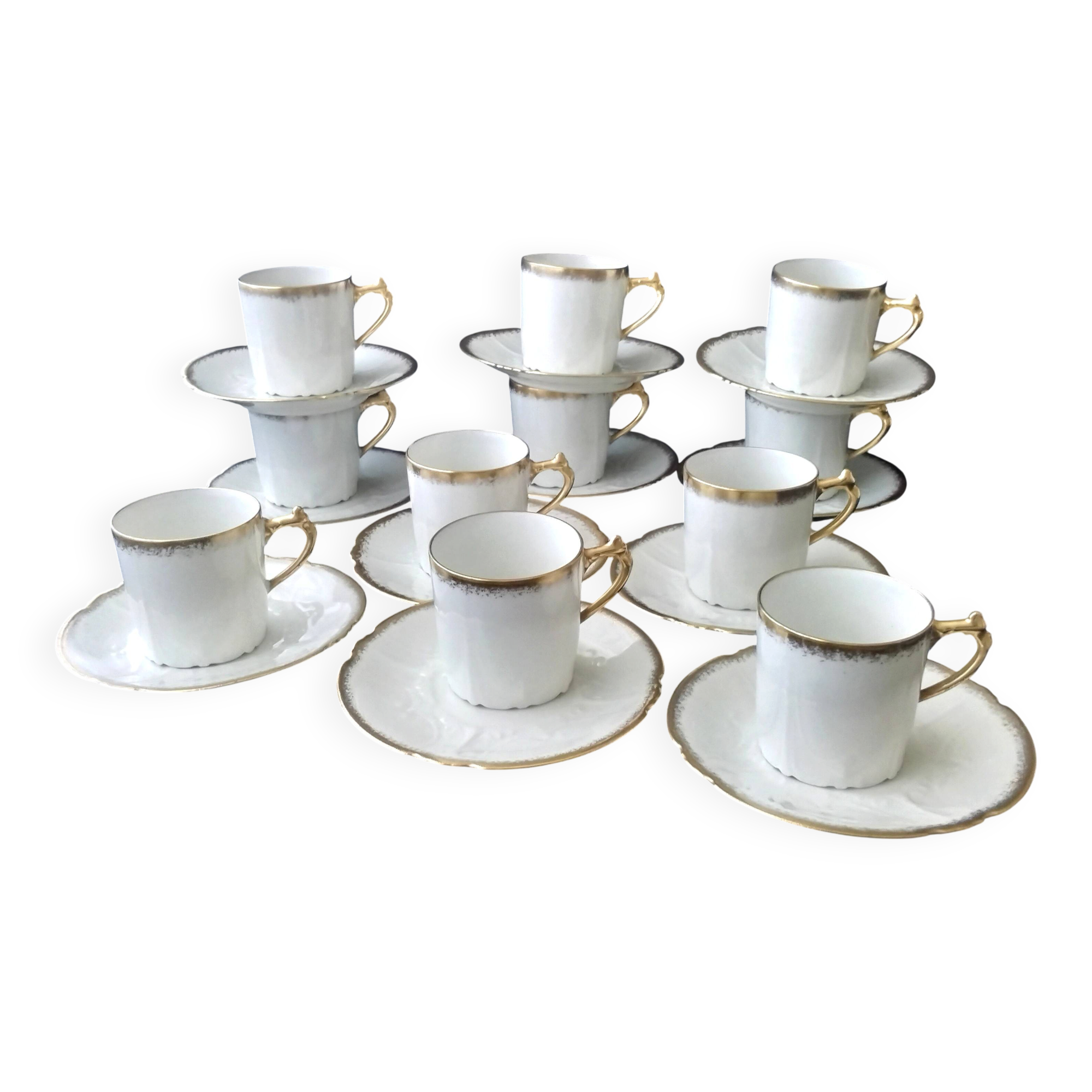 11 coffee cups in litre shape made of Limoges porcelain