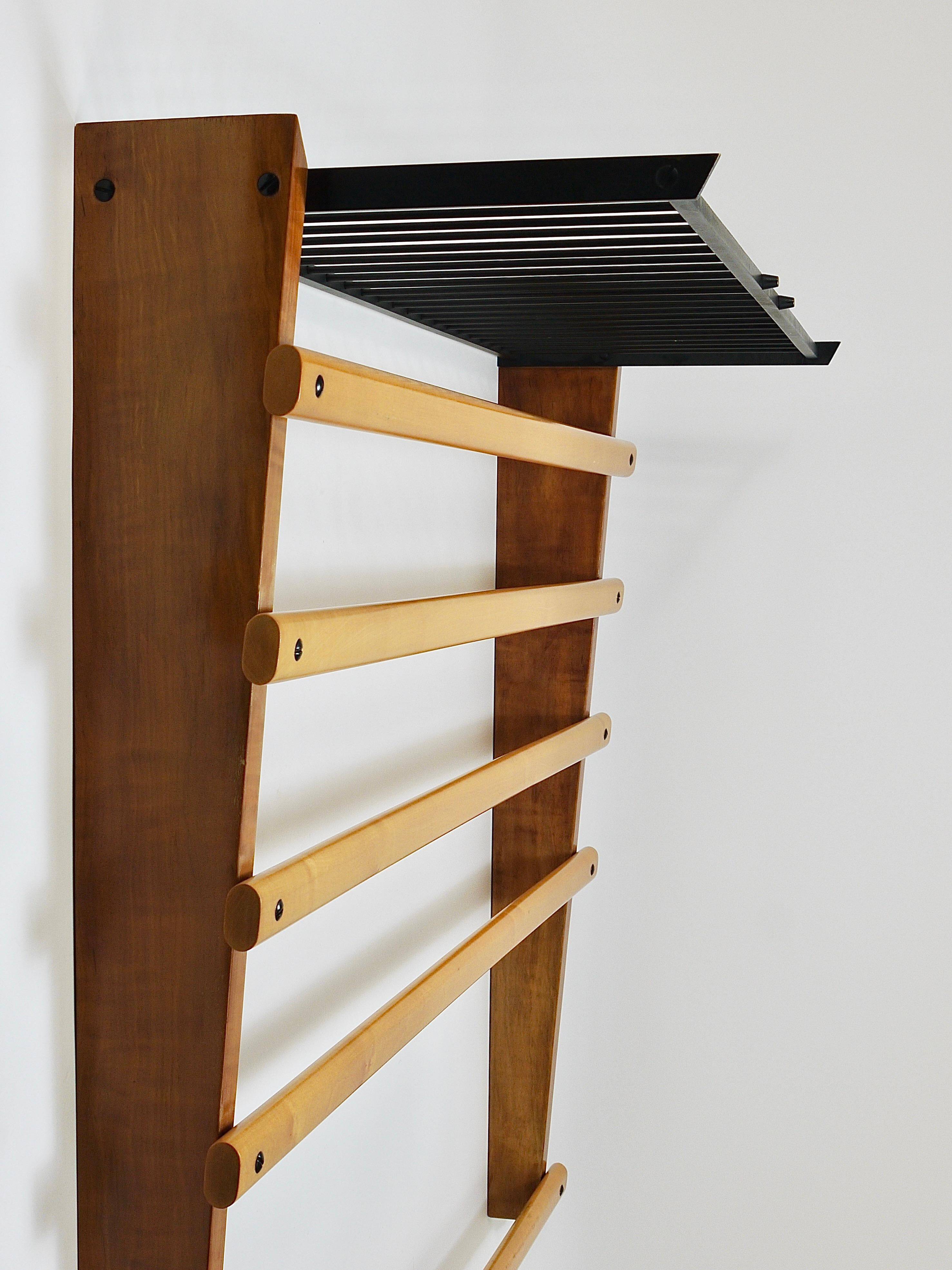 Rare coat rack by Carl Auböck with hat rack, cabinet, brass, walnut and beech, 1950s.