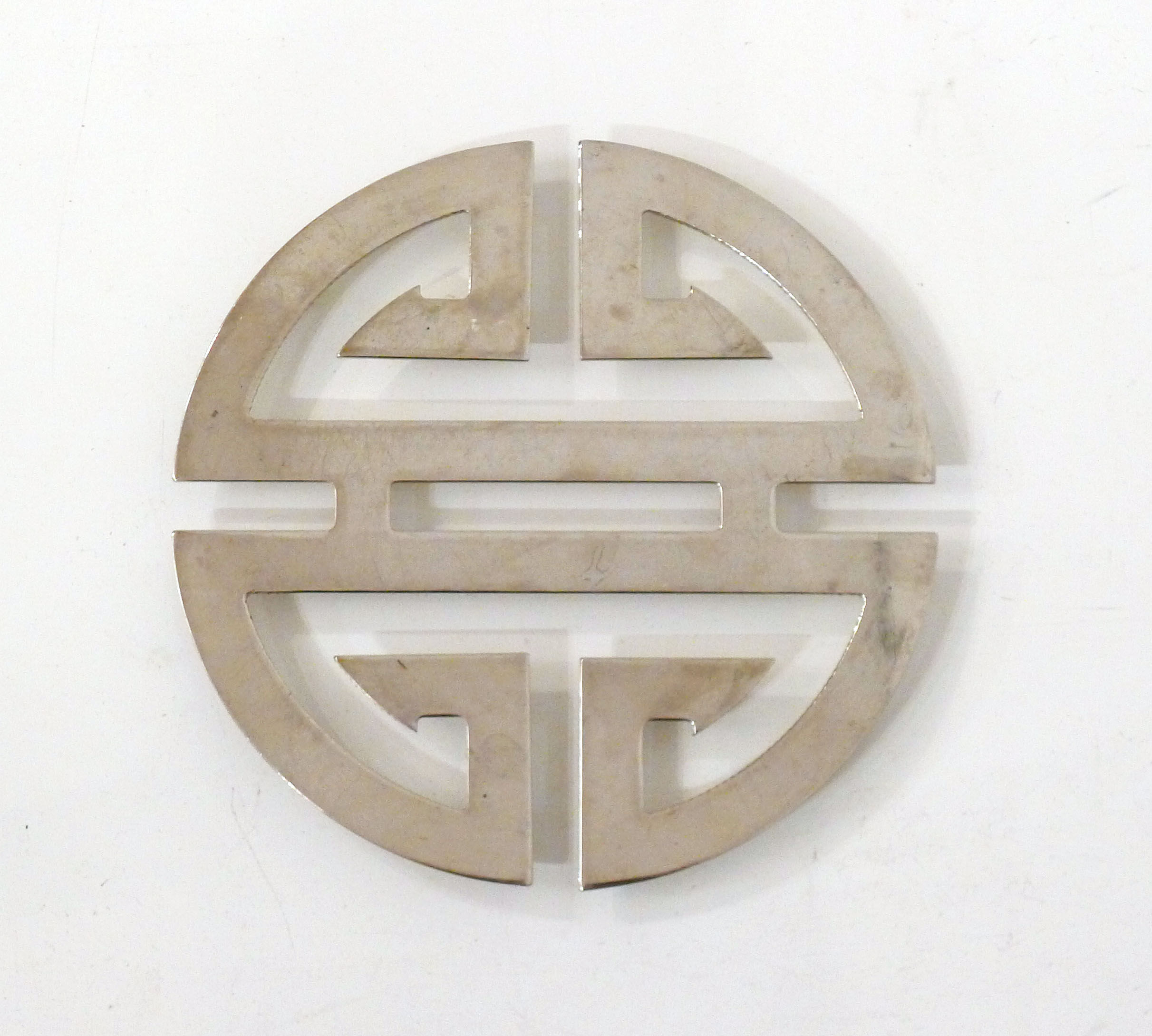 Under the geometric plate opened