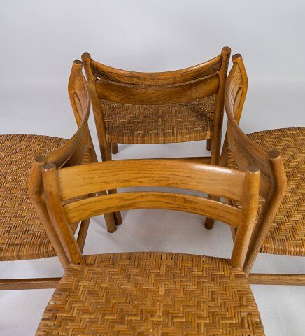 A set of four dining room chairs in oak and seat in papercord, designed by Børge Mogensen