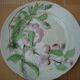 Set of 4 Keller and Guerin St Clement Majolica plates with fruit decoration.