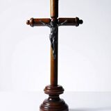 Antique wooden altar crucifix with a turned design and silver-plated Christ.