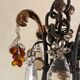 Lustrous chandelier with pendants and glass fruits, Maison Baguès, six lights.