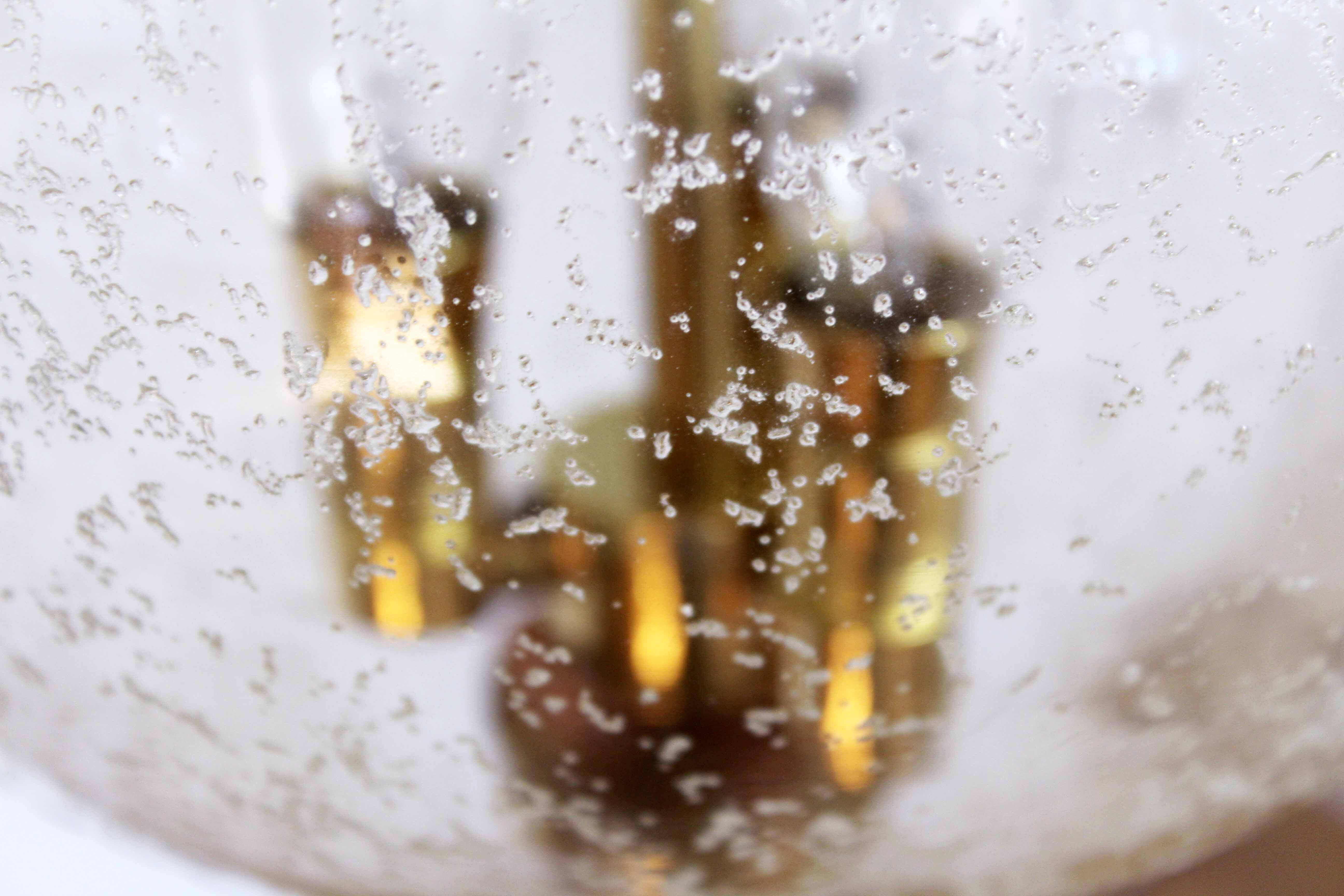 Limburg pendant lamp in glass and brass