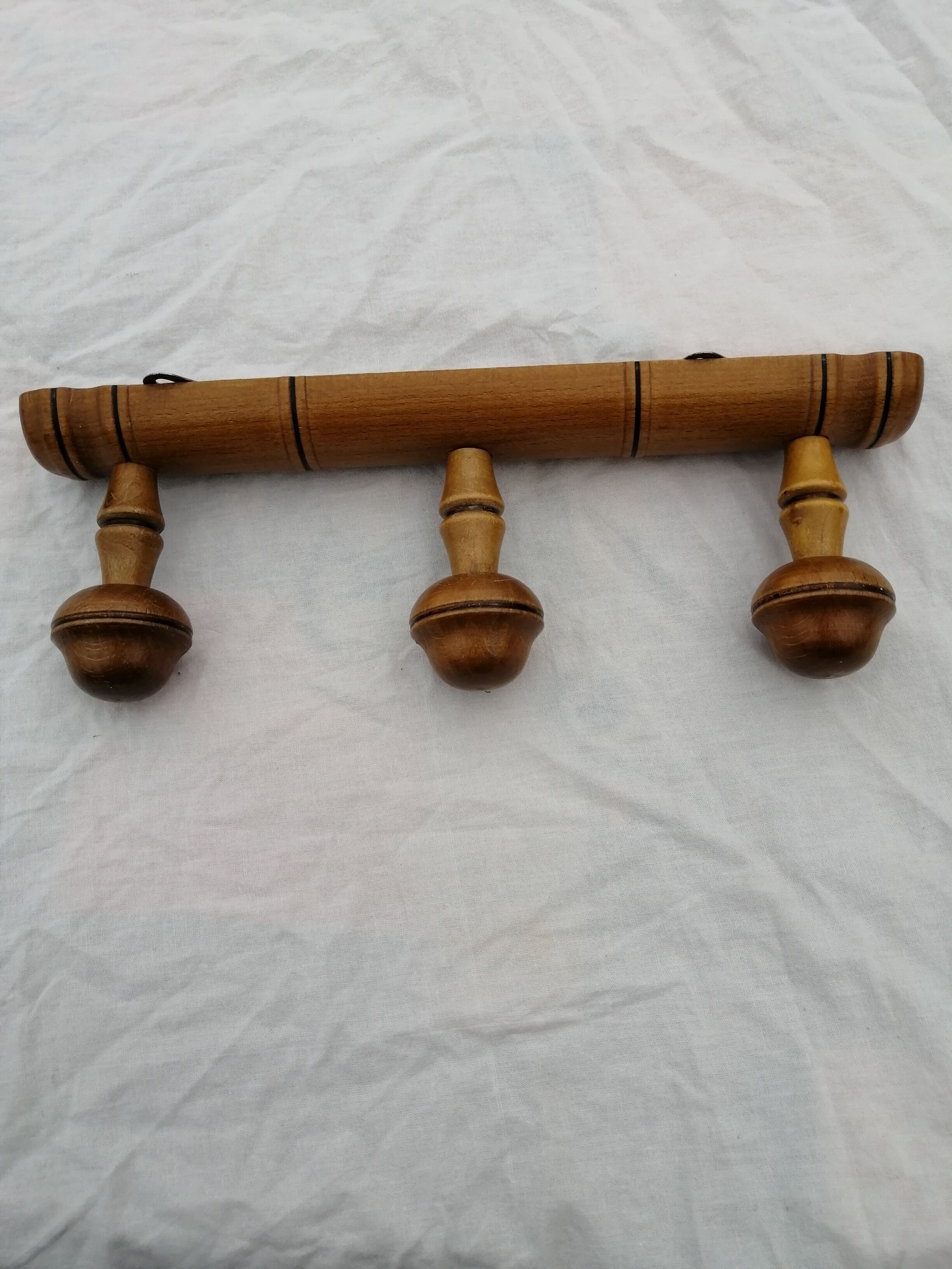 Wooden wall coat rack