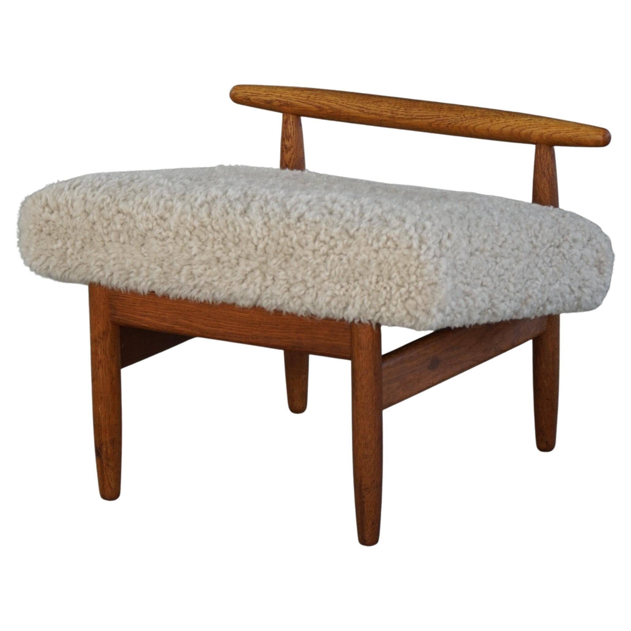 Eivind A. Johansen, pouf in oak with lightweight lambswool upholstery for FDB Møbler.