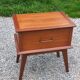 Vintage bedside table with compass legs from the 50s