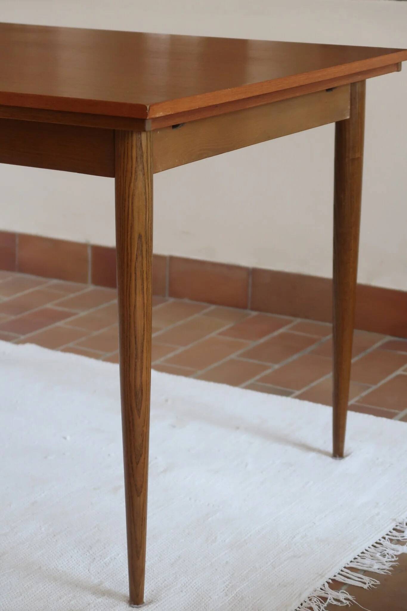 Extendable dining table in teak, tapered legs, 1960s.