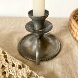 Tin thumb candle holder