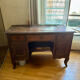 Solid wood desk from the early 20th century.
