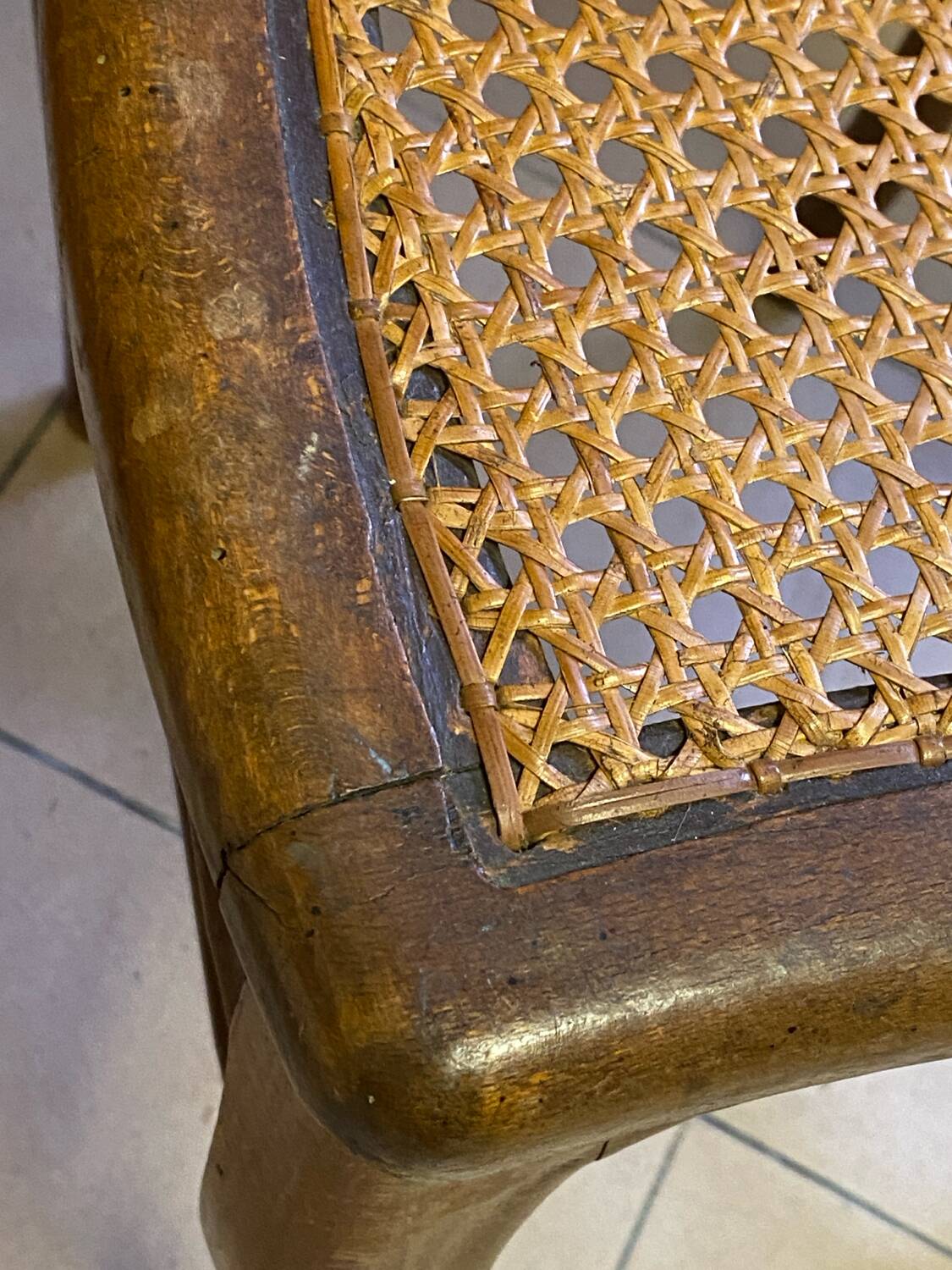 Antique wooden chair, cane seat
