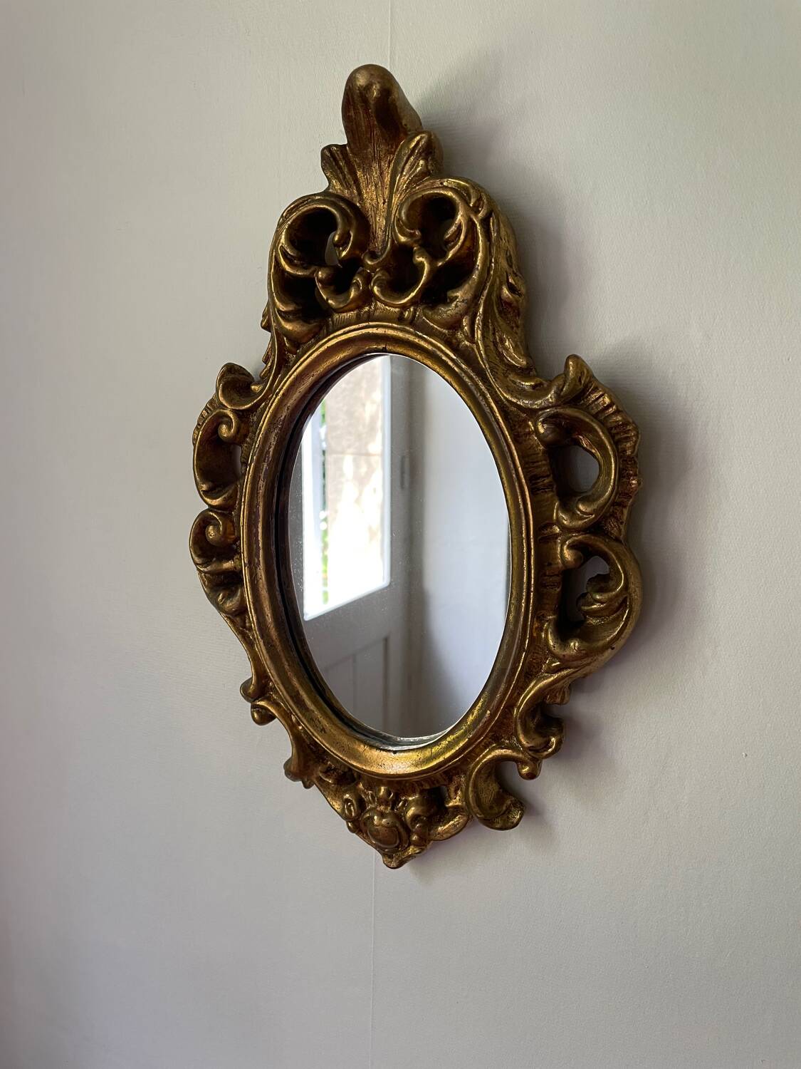 Golden rockery mirror