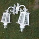 Pair of wrought iron lanterns