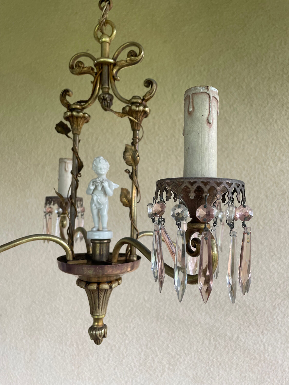 Antique bronze chandelier with porcelain angel.