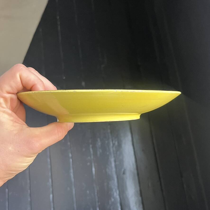 Yellow ceramic plate by Georges Jouve
