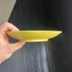 Yellow ceramic plate by Georges Jouve