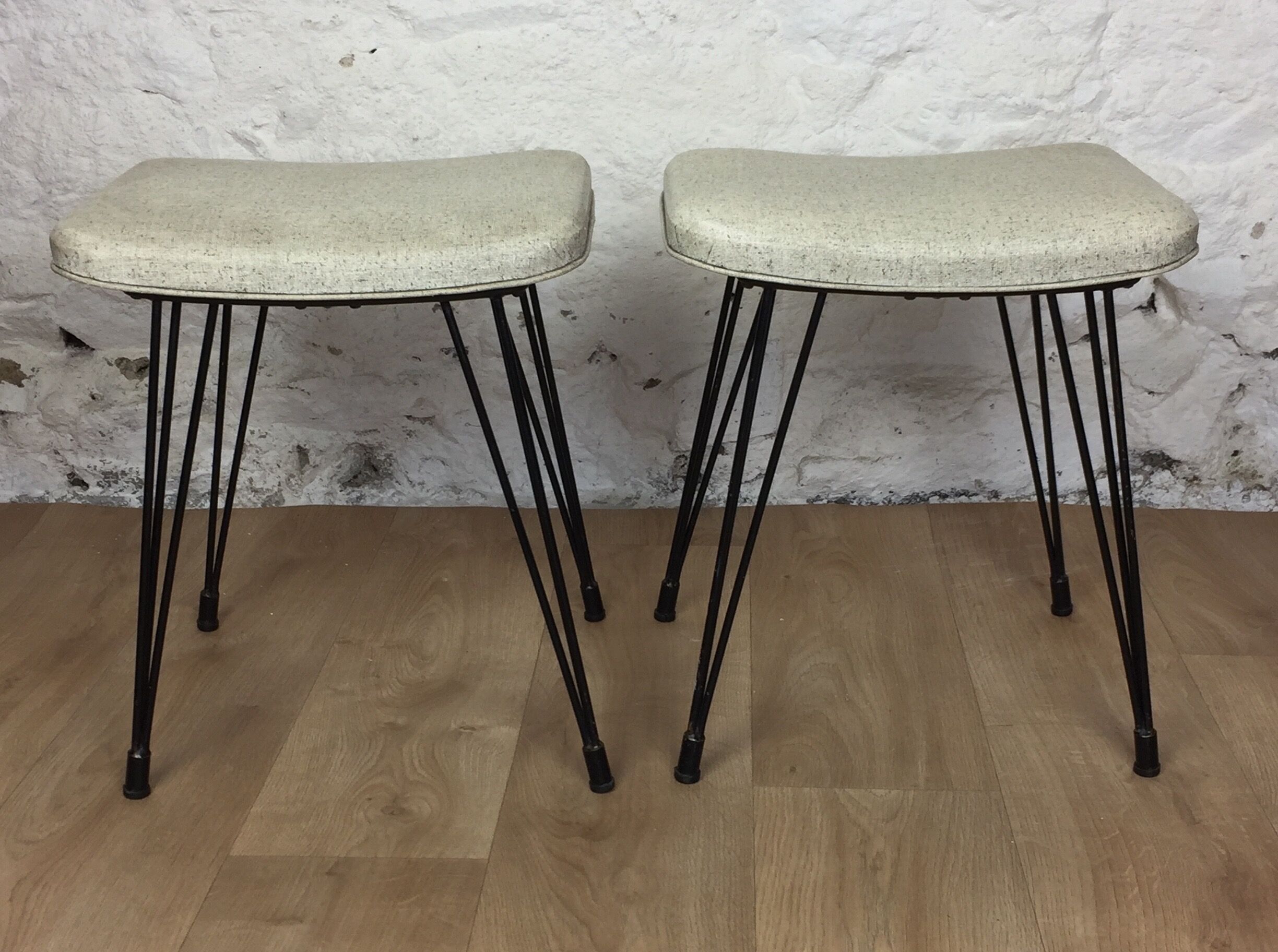 Pair of Eiffel foot stools and 60s skai seating