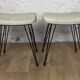 Pair of Eiffel foot stools and 60s skai seating