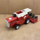 Red combine harvester