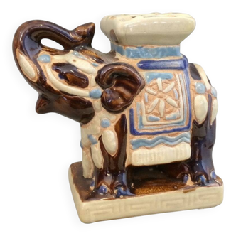 Small brown ceramic elephant vase