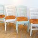 Suite de 4 chaises en bois et paille