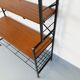 Vintage Italian bookshelf in teak and metal from the 1960s.