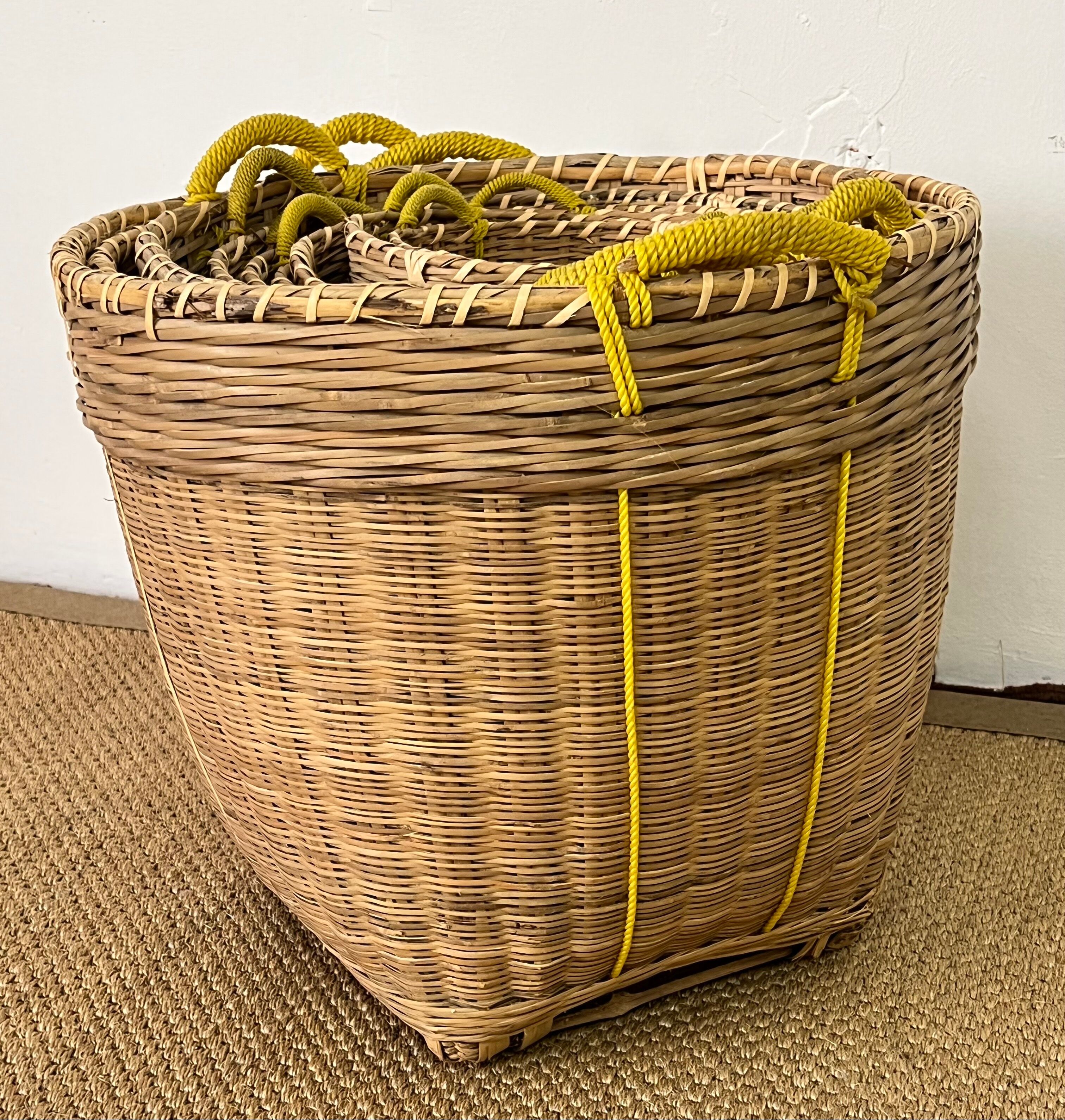 Set of 9 wicker trundle baskets