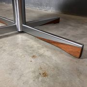 Mid Century coffee table in chrome, marble, and rosewood.