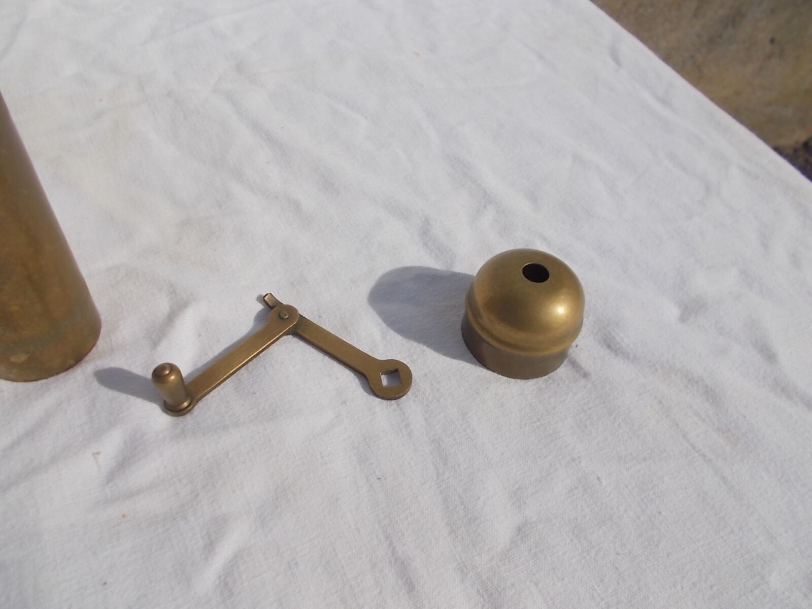 Oriental brass pepper mill