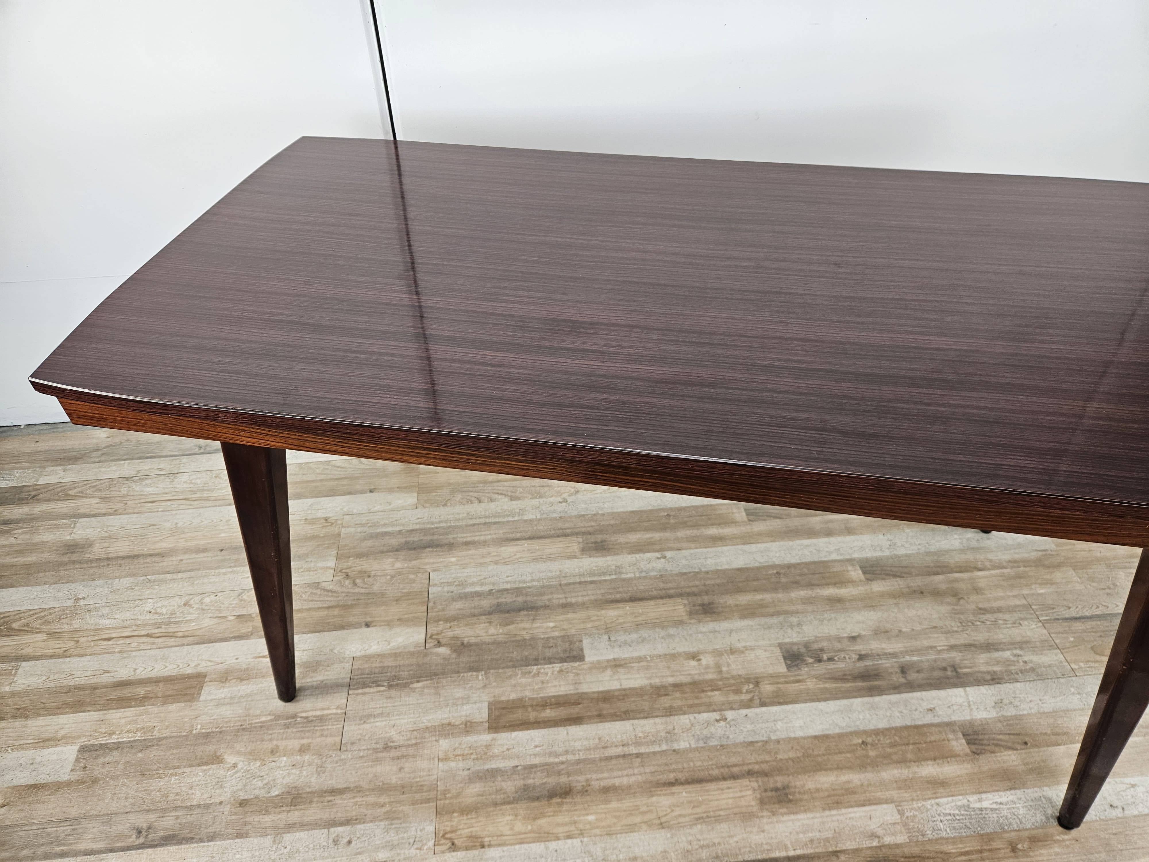 Mid Century table in rosewood laminate