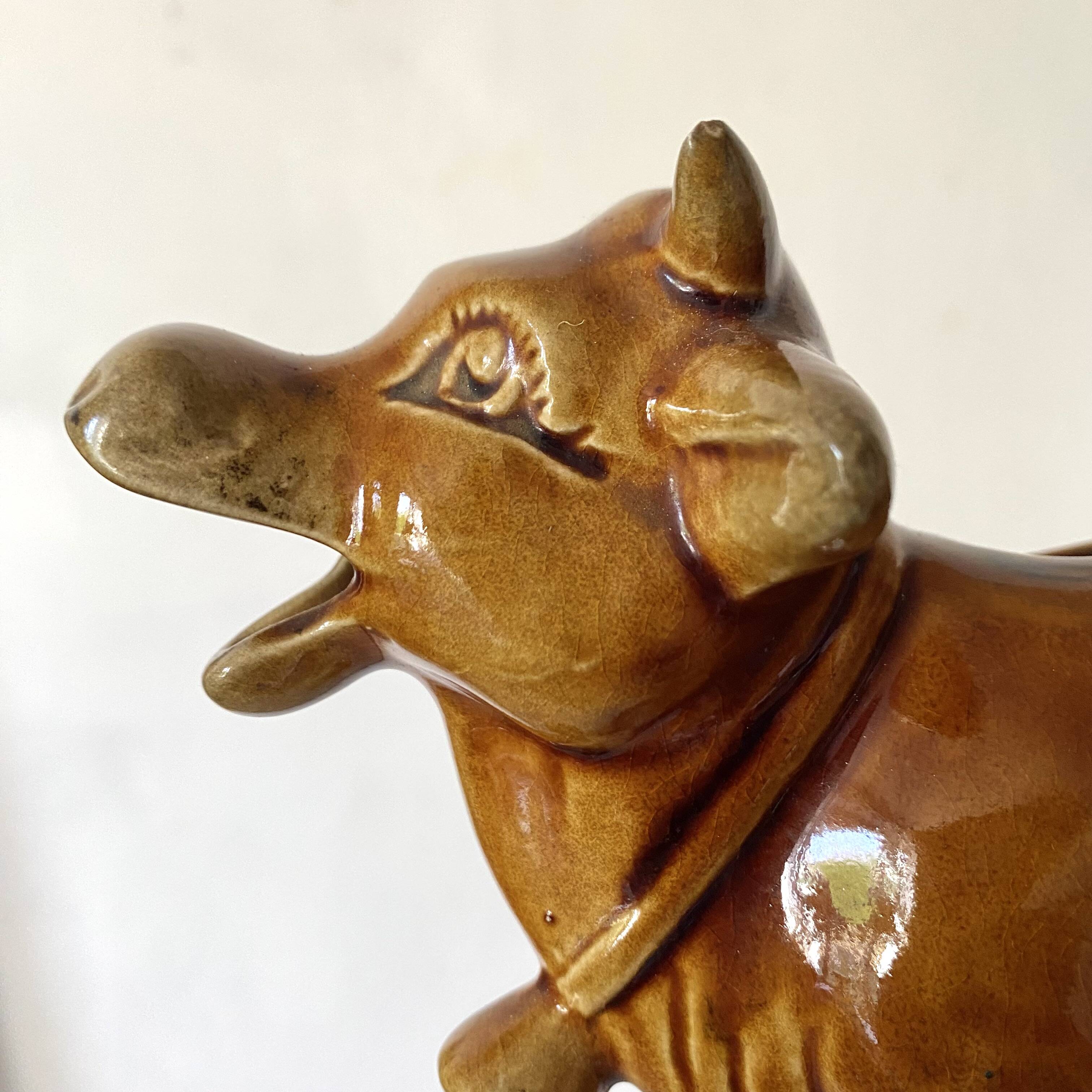 Creamer, zoomorphic cow milk jug Arthur Wood, England