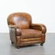 Charming and comfortable vintage armchair in grained cowhide leather with character