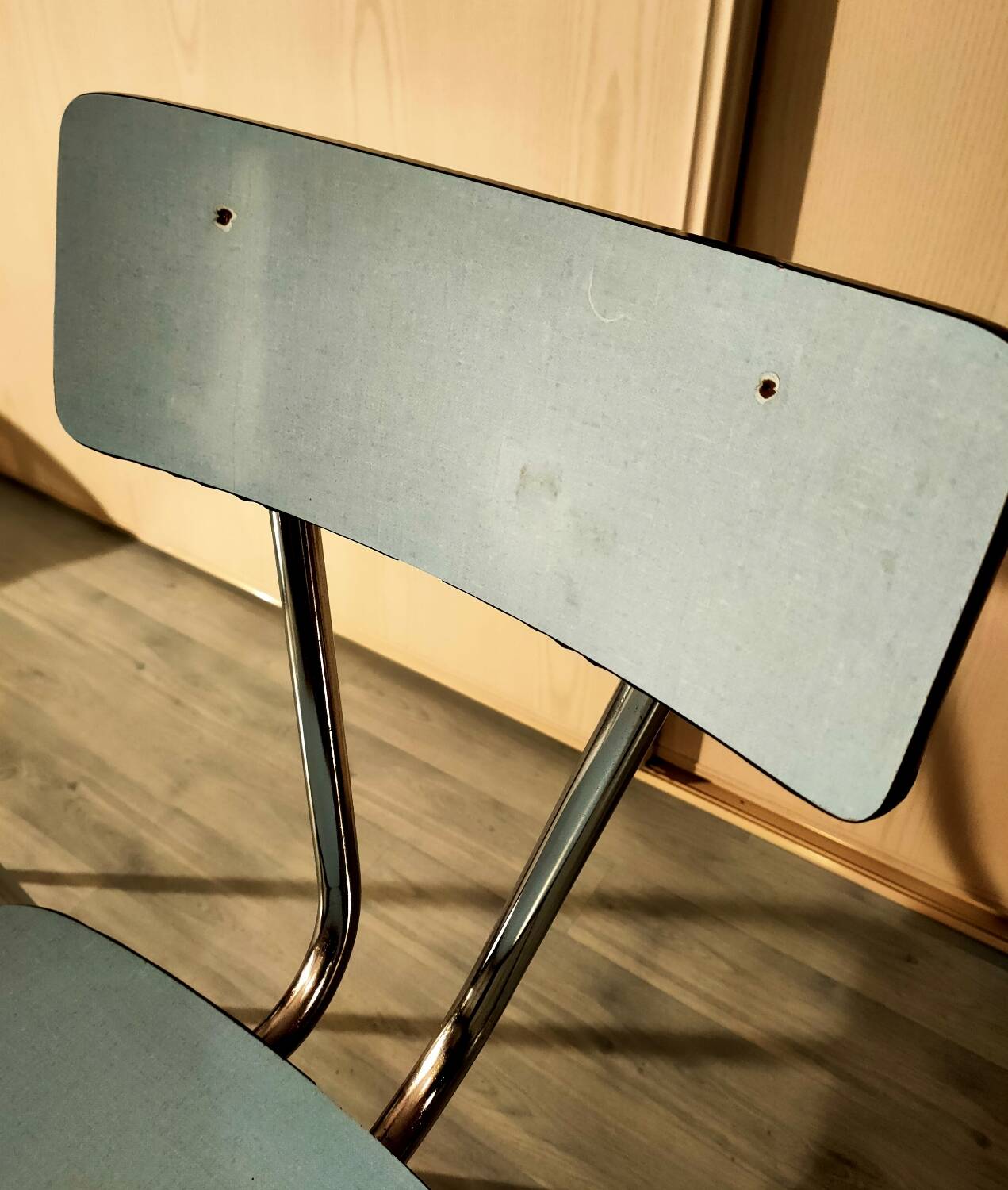 Pair of blue formica chairs