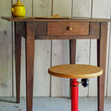 Old rustic wooden farmhouse table in 50s
