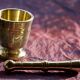 Mortar and its brass pestle with oriental gold and silver motifs