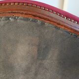 Red voltaire armchair