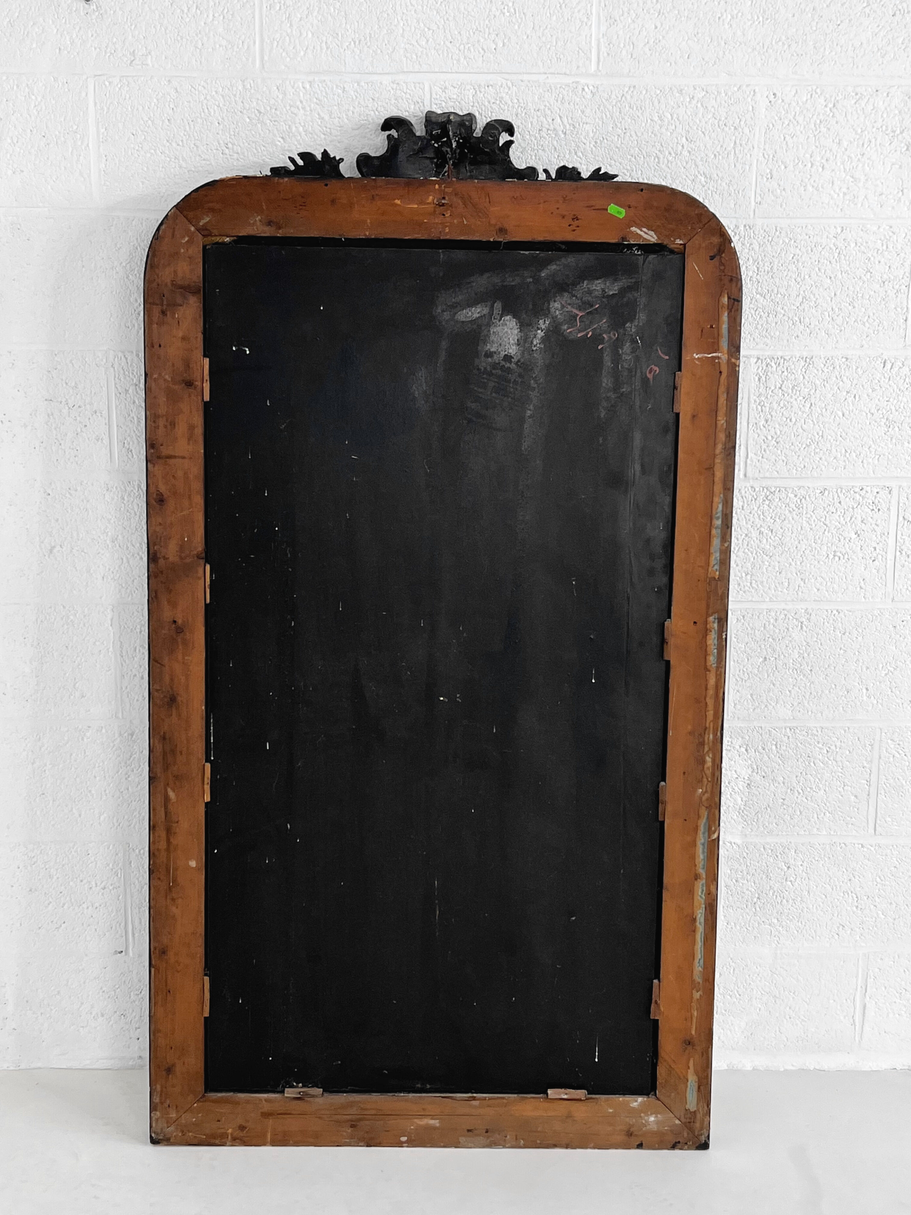 Old wooden mirror in Baroque or Napoleonic style