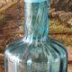 Large blown crystal bottle, twisted, turquoise blue, early 20th century.