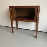 Old wooden cabinet with extendable doors