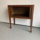 Old wooden cabinet with extendable doors