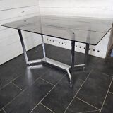 Chromed metal table with smoked glass top